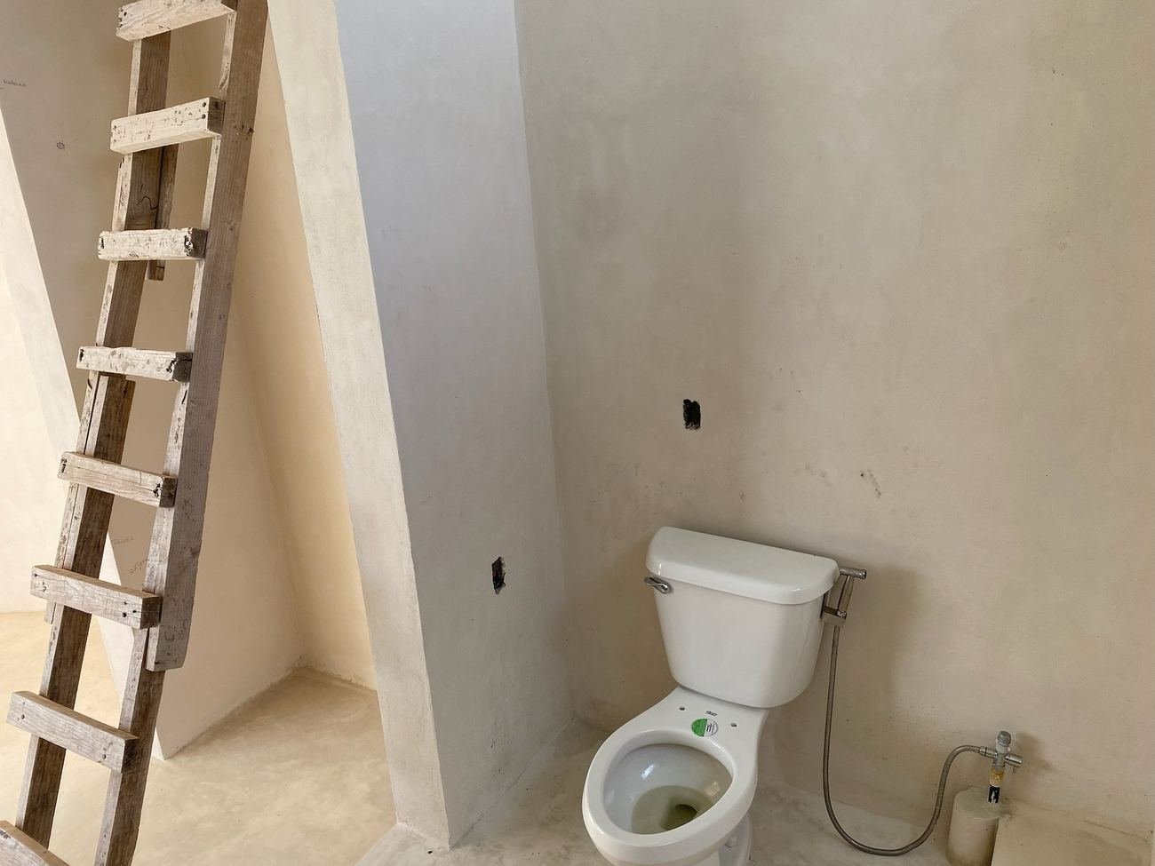 Bathroom under construction at Rancho Verde Tulum, before