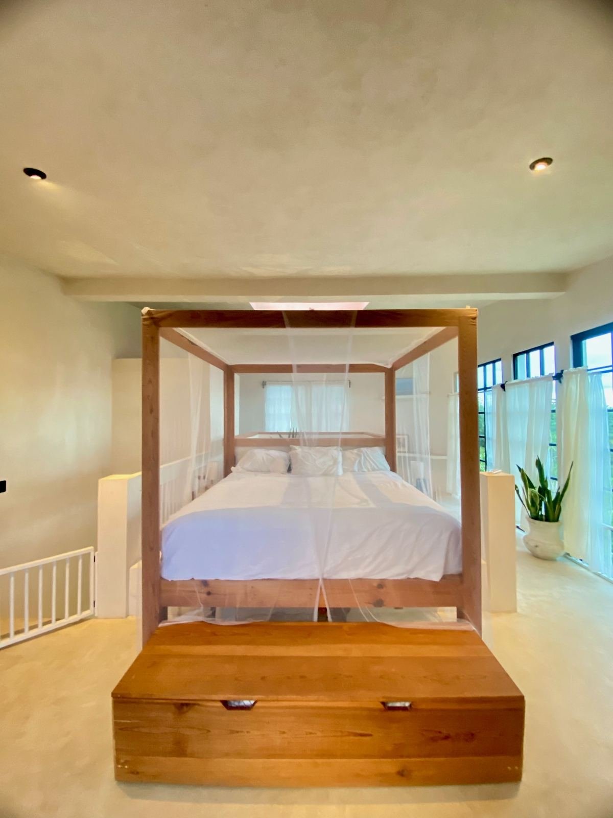 Canopy bed suite with skylight at Rancho Verde Tulum
