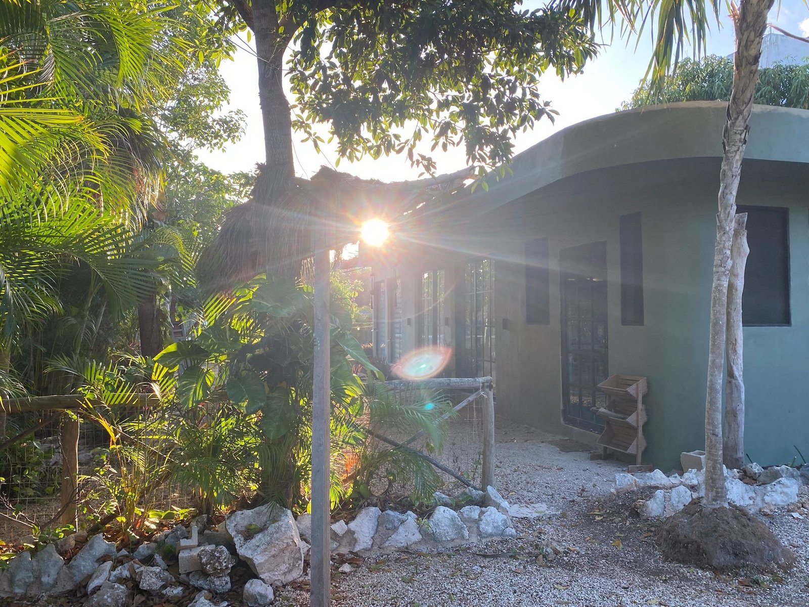 Finished jungle house at Rancho Verde Tulum at sunset — design-build construction