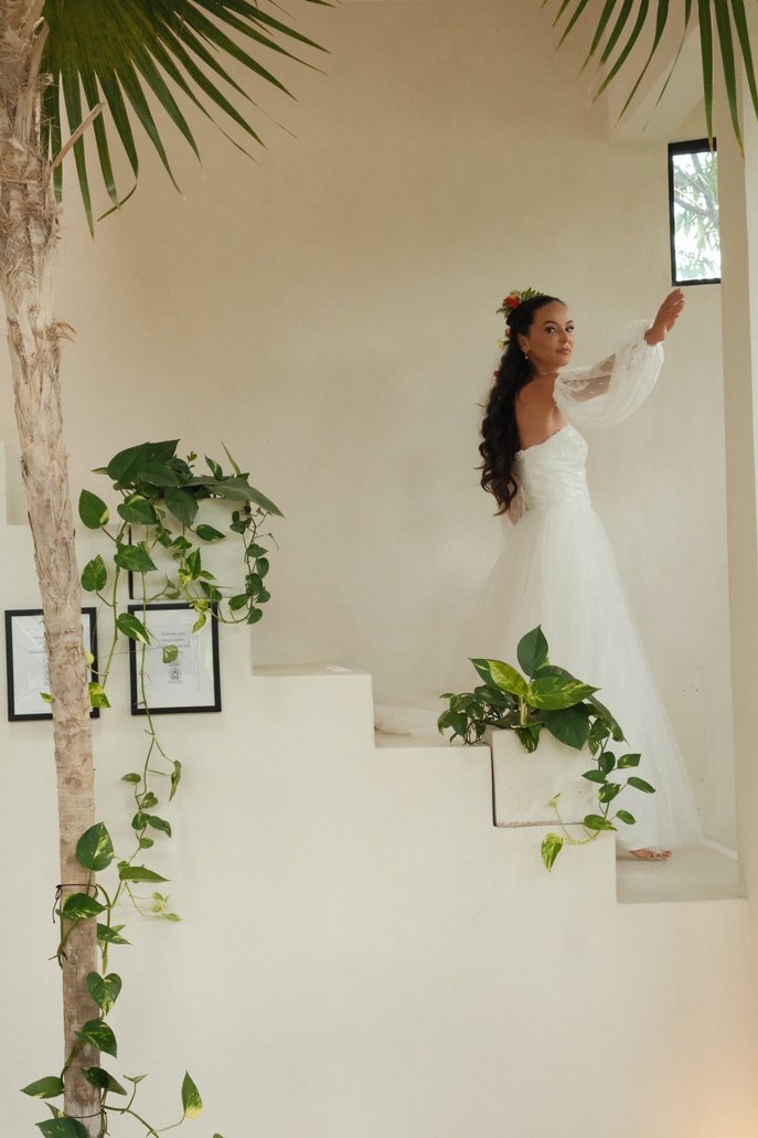 Bride on the villa's interior staircase at Rancho Verde