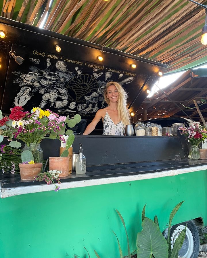 Liefs cafe bar counter with plants in Tulum