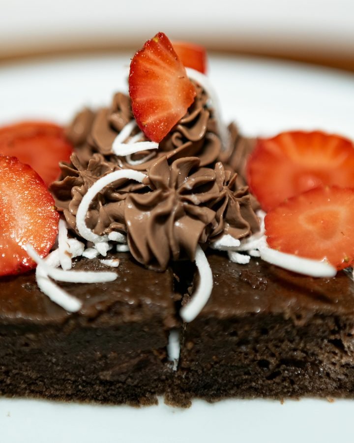 Chocolate brownie with strawberries and coconut at Liefs Tulum