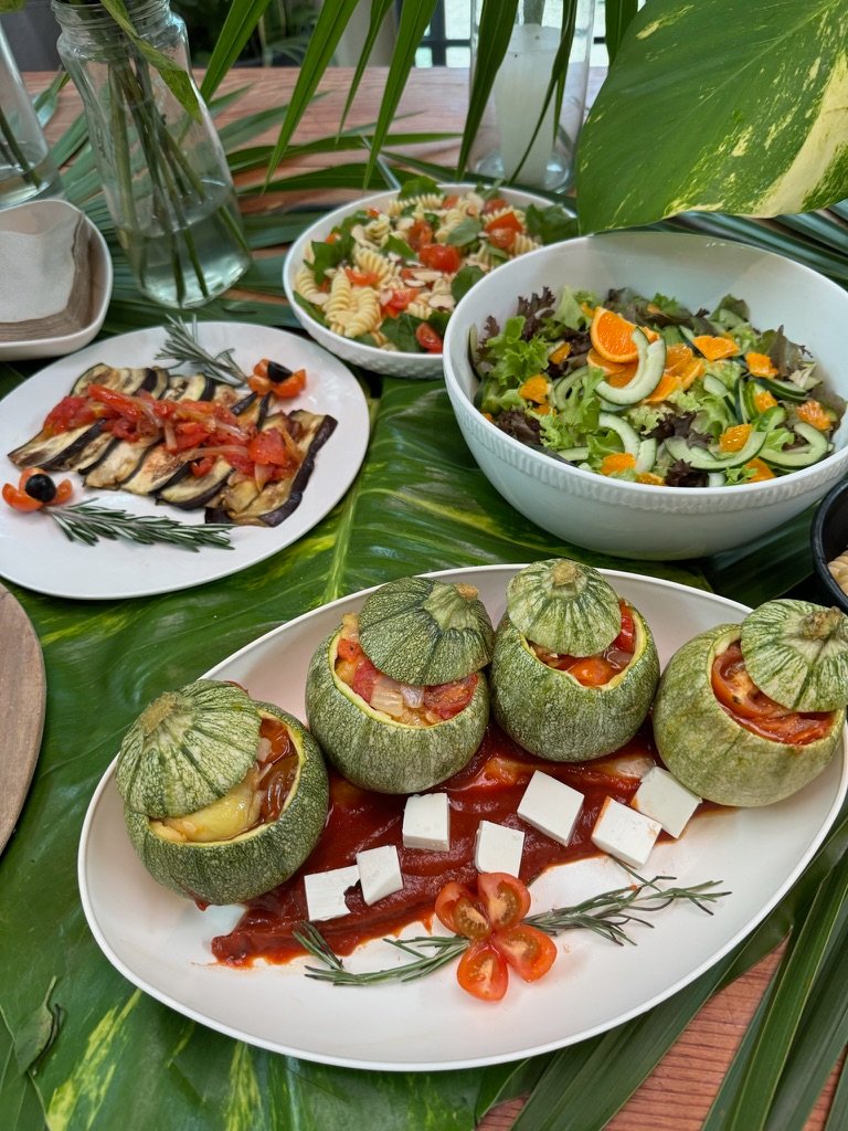 Stuffed zucchini and fresh garden salad, vegan retreat catering in Tulum