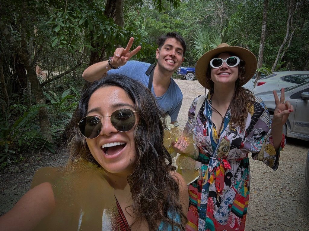 Guests smiling on a forest road at Rancho Verde Tulum