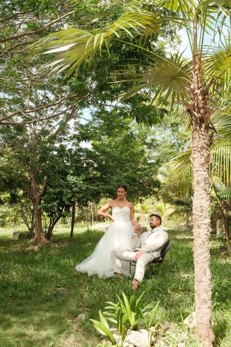 Couple relaxing in the garden at Rancho Verde Tulum